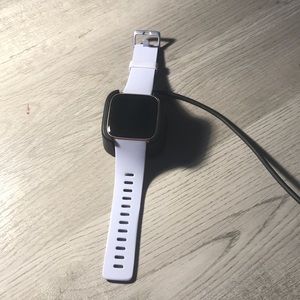 Rose Gold Fitbit Versa with Purple Wrist Band!